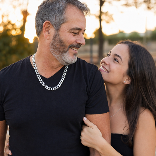 Father wearing Cuban link chain with daughter - emotional lifestyle photo